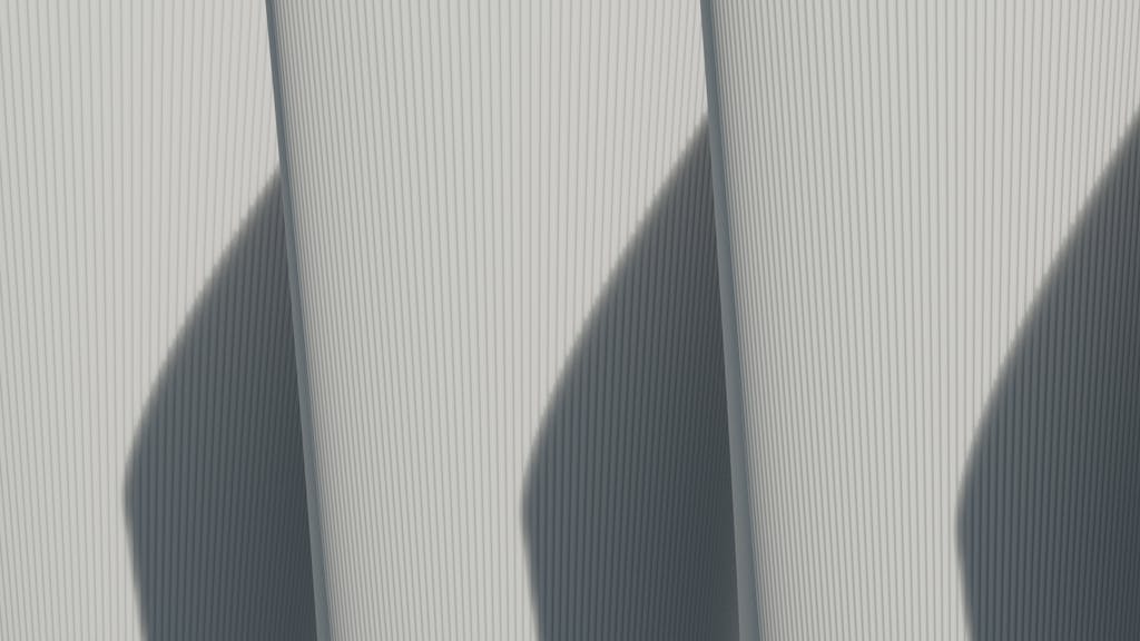 Sodiceram Abstract architectural image showcasing minimalist lines and strong shadows.