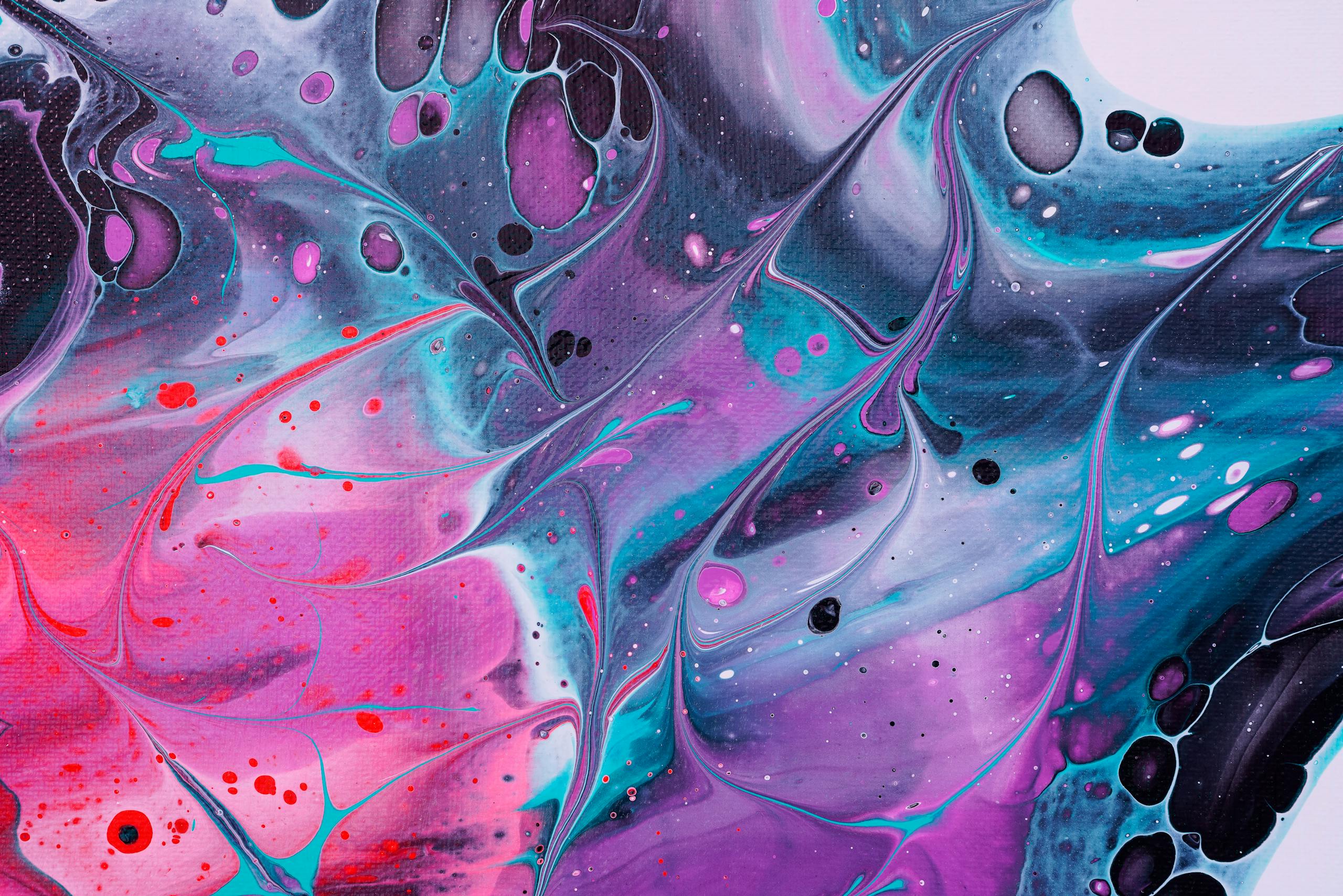 Kongotech Org Vibrant swirls of color in abstract fluid art creating a psychedelic pattern.